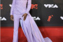The VMA's outfits for the evening! Lil Nas x in purple women like outfit